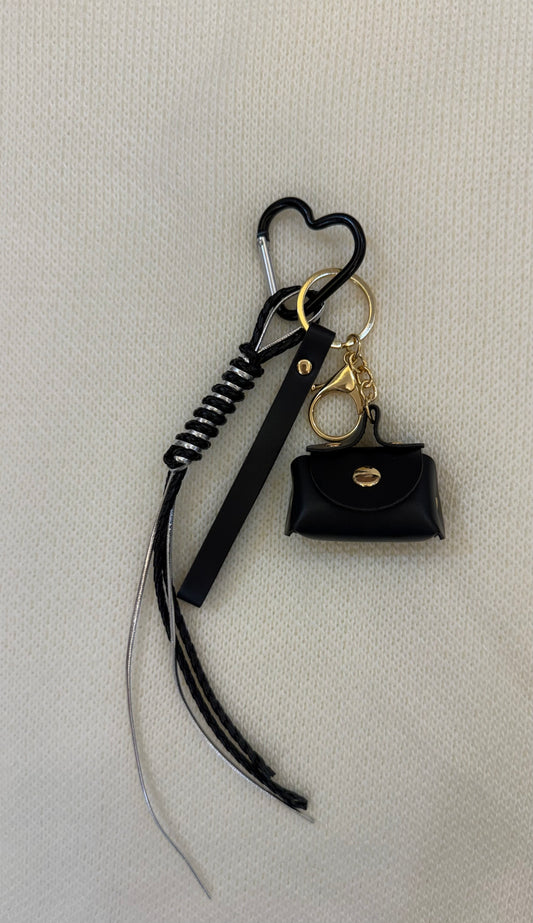 Black bag charm